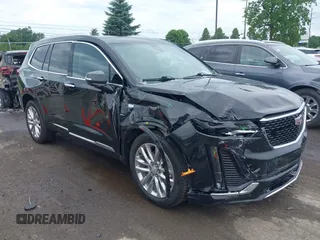2022 Cadillac XT6 Premium Luxury with VIN 1GYKPDRS6NZ156380, listed as a IAAI auction lot 42542067 with 42,563 mi miles and . Bid and sale history available at DreamBid. Image 1.