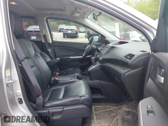 2012 Honda CR-V EX-L with VIN 2HKRM4H7XCH623122, listed as a IAAI auction lot 42204835 with 231,735 mi miles and . Bid and sale history available at carsss.com. Image 5.