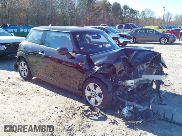2014 MINI Hardtop with VIN WMWXM5C51ET972099, listed as a IAAI auction lot 41595497 with 113,496 mi miles and . Bid and sale history available at DreamBid. Image 1.
