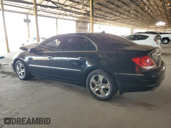 2005 Acura RL z VIN JH4KB16575C011187, wystawiony jako Copart lot #60276655 z przebiegiem 107 378 mil mil oraz Szkoda całkowita • Salvage title. Historia ofert i sprzedaży dostępna na DreamBid. Obrazek 2.