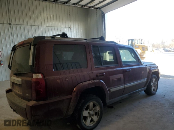 2007 Jeep Commander Limited with VIN 1J8HG582X7C553502, listed as a Copart auction lot 89201285 with 184,233 mi miles and Salvage title. Bid and sale history available at DreamBid. Image 3.