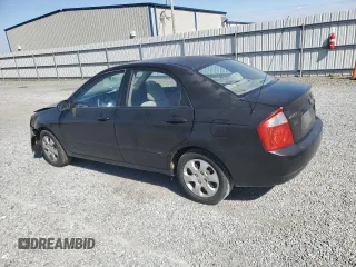 2004 Kia Spectra LX with VIN KNAFE121X45021922, listed as a Copart auction lot 49989845 with 184,189 mi miles and Salvage Title. Bid and sale history available at carsss.com. Image 2.