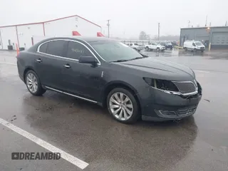 2014 Lincoln MKS with VIN 1LNHL9DK9EG605607, listed as a IAAI auction lot 41476087 with 114,846 mi miles. Bid and sale history available at carsss.com. Image 1.