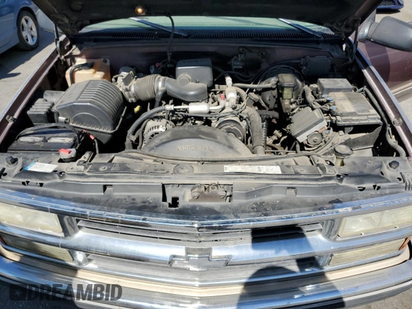 1997 Chevrolet Suburban with VIN 1GNEC16R4VJ418725, listed as a Copart auction lot 75766084 with 216,722 mi miles and Salvage Title. Bid and sale history available at carsss.com. Image 12.