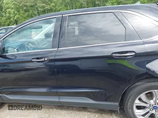 2021 Ford Edge Titanium z VIN 2FMPK3K99MBA16882, wystawiony jako IAAI lot #42214606 z przebiegiem 140 031 mil mil oraz . Historia ofert i sprzedaży dostępna na DreamBid. Obrazek 14.