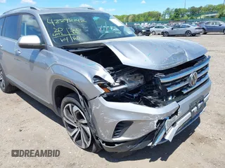 2023 Volkswagen Atlas SEL z VIN 1V2BR2CA2PC510744, wystawiony jako IAAI lot #42292142 z przebiegiem 20 612 mil mil oraz . Historia ofert i sprzedaży dostępna na DreamBid. Obrazek 6.
