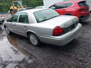 2010 Mercury Grand Marquis LS z VIN 2MEBM7FV5AX606629, wystawiony jako IAAI lot #42345444 z przebiegiem 66 600 mil mil oraz . Historia ofert i sprzedaży dostępna na DreamBid. Obrazek 3.
