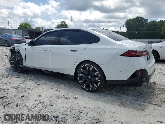 2024 BMW 5 Series 540i xDrive with VIN WBA63FJ04RCS00990, listed as a Copart auction lot 60112415 with Not provided miles and Salvage title. Bid and sale history available at DreamBid. Image 2.