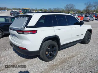 2023 Jeep Grand Cherokee Laredo with VIN 1C4RJHAG1PC515399, listed as a IAAI auction lot 41929215 with 27,986 mi miles and . Bid and sale history available at DreamBid. Image 4.
