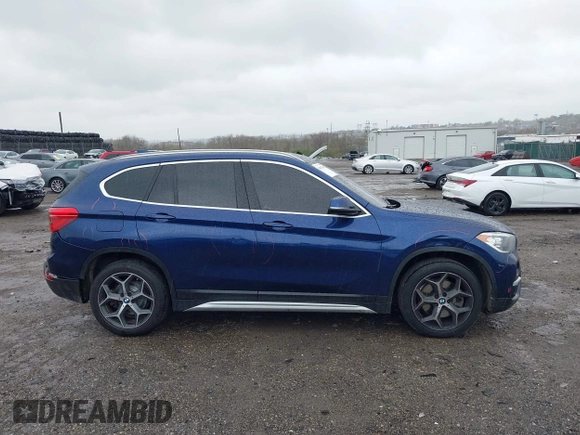 2019 BMW X1 sDrive28i z VIN WBXHU7C5XK5L10933, wystawiony jako IAAI lot #41931162 z przebiegiem 55 308 mil mil oraz . Historia ofert i sprzedaży dostępna na DreamBid. Obrazek 13.