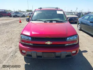 2004 Chevrolet TrailBlazer LT with VIN 1GNDS13S842376090, listed as a IAAI auction lot 42075638 with 112,519 mi miles. Bid and sale history available at carsss.com. Image 6.