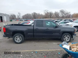 2014 Chevrolet Silverado 1500 LT with VIN 1GCVKREC8EZ325070, listed as a IAAI auction lot 41328199 with 164,009 mi miles and . Bid and sale history available at DreamBid. Image 13.