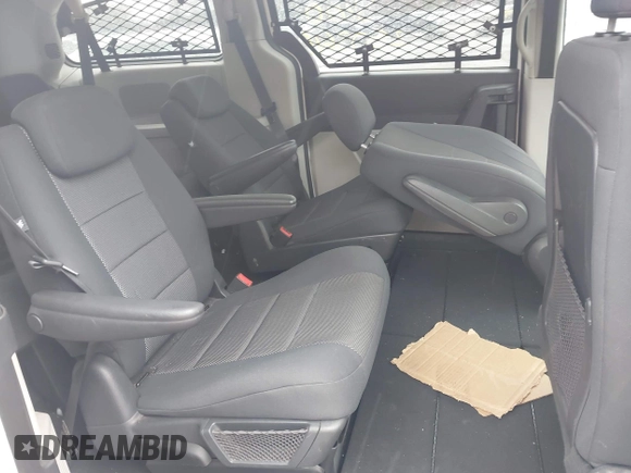 2009 Dodge Grand Caravan SE z VIN 2D8HN44E59R686932, wystawiony jako IAAI lot #41980994 z przebiegiem Nie podano mil oraz . Historia ofert i sprzedaży dostępna na DreamBid. Obrazek 8.