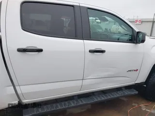 2021 GMC Canyon 4WD AT4 w/Leather with VIN 1GTG6FEN6M1154040, listed as a IAAI auction lot 41209527 with 29,484 mi miles. Bid and sale history available at carsss.com. Image 13.