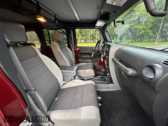 2007 Jeep Wrangler Unlimited X with VIN 1J8GA39147L156911, listed as a Copart auction lot 65987405 with 115,766 mi miles and Clean title. Bid and sale history available at DreamBid. Image 5.