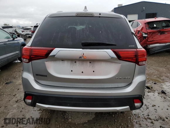 2018 Mitsubishi Outlander ES z VIN JA4AZ3A3XJZ062453, wystawiony jako Copart lot #55823265 z przebiegiem 59 084 mil mil oraz Szkoda całkowita • Salvage title. Historia ofert i sprzedaży dostępna na DreamBid. Obrazek 6.