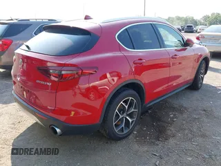 2019 Alfa Romeo Stelvio Ti z VIN ZASPAKBNXK7C31179, wystawiony jako IAAI lot #42489493 z przebiegiem 53 843 mil mil oraz . Historia ofert i sprzedaży dostępna na DreamBid. Obrazek 4.