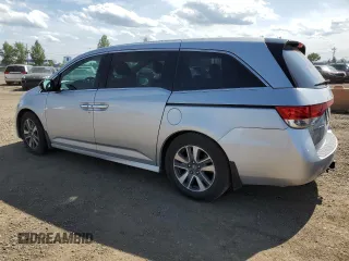2014 Honda Odyssey Touring with VIN 5FNRL5H91EB502555, listed as a Copart auction lot 61872285 with 203,448 mi miles and Salvage title. Bid and sale history available at DreamBid. Image 2.