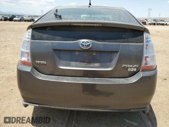 2007 Toyota Prius z VIN JTDKB20U773262222, wystawiony jako Copart lot #59323905 z przebiegiem 138 274 mil mil oraz Czysty tytuł • Clean title. Historia ofert i sprzedaży dostępna na DreamBid. Obrazek 6.