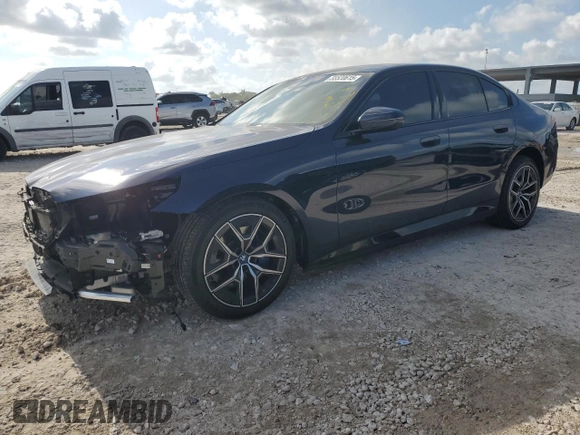 2024 BMW i5 eDrive40 with VIN WBY33FK09RCR50159, listed as a Copart auction lot 55520615 with 12,564 mi miles and Salvage title. Bid and sale history available at DreamBid. Image 1.