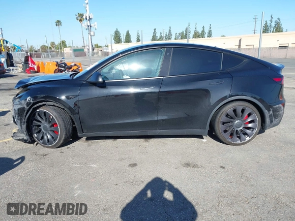 2022 Tesla Model Y Performance with VIN 7SAYGDEF5NF336693, listed as a IAAI auction lot 41805752 with 42,009 mi miles and . Bid and sale history available at DreamBid. Image 13.