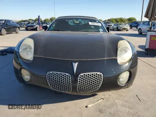 2007 Pontiac Solstice z VIN 1G2MB35B57Y141041, wystawiony jako Copart lot #70661994 z przebiegiem Nie podano mil oraz Czysty tytuł • Clean title. Historia ofert i sprzedaży dostępna na DreamBid. Obrazek 5.