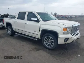 2015 GMC Sierra 1500 Denali with VIN 3GTU2WEC1FG356270, listed as a IAAI auction lot 41804849 with 124,473 mi miles. Bid and sale history available at carsss.com. Image 1.
