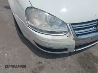 2006 Volkswagen Jetta 1.9L TDI z VIN 3VWRT71K86M632237, wystawiony jako IAAI lot #42390120 z przebiegiem 359 623 mil mil oraz . Historia ofert i sprzedaży dostępna na DreamBid. Obrazek 6.