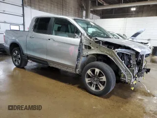 2019 Honda Ridgeline RTL-T with VIN 5FPYK3F60KB009495, listed as a Copart auction lot 61578405 with 90,586 mi miles and Salvage title. Bid and sale history available at DreamBid. Image 4.