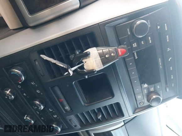 2010 Dodge Grand Caravan SXT with VIN 2D4RN5D17AR444818, listed as a IAAI auction lot 40941591 with Not Provided miles and . Bid and sale history available at DreamBid. Image 11.