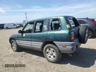 1999 Toyota RAV4 with VIN JT3GP10V9X7044726, listed as a Copart auction lot 55180935 with 196,509 mi miles and Salvage Title. Bid and sale history available at DreamBid. Image 2.