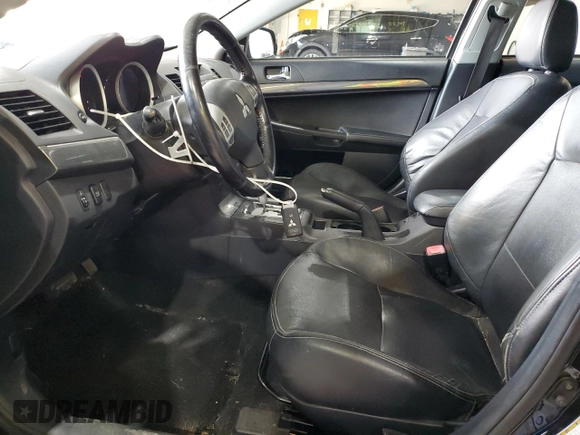 2010 Mitsubishi Lancer GTS with VIN JA32X8HW7AU001795, listed as a Copart auction lot 68226064 with 144,272 mi miles and Salvage Title. Bid and sale history available at carsss.com. Image 7.
