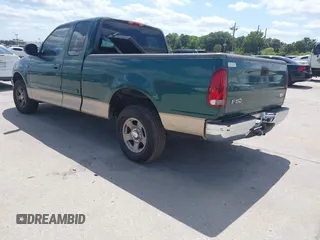 2000 Ford F-150 XL with VIN 1FTZX1729YNB93649, listed as a IAAI auction lot 42069599 with 1 mi miles. Bid and sale history available at carsss.com. Image 3.