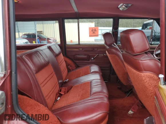 1986 Jeep Grand Wagoneer z VIN 1JCNJ15U6GT029563, wystawiony jako Copart lot #78917364 z przebiegiem 115 025 mil mil oraz Szkoda całkowita • Salvage title. Historia ofert i sprzedaży dostępna na DreamBid. Obrazek 11.