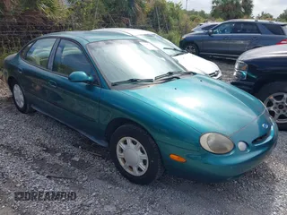 1997 Ford Taurus GL z VIN 1FALP52U8VA147714, wystawiony jako IAAI lot #40781743 z przebiegiem 57 823 mil mil oraz . Historia ofert i sprzedaży dostępna na DreamBid. Obrazek 1.