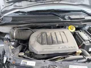 2014 Dodge Grand Caravan SE with VIN 2C4RDGBG6ER475051, listed as a IAAI auction lot 41857218 with 230,842 mi miles. Bid and sale history available at carsss.com. Image 10.