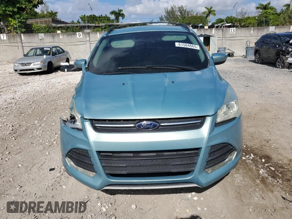 2013 Ford Escape SE z VIN 1FMCU0GX8DUA92814, wystawiony jako Copart lot #61564665 z przebiegiem 110 854 mil mil oraz Szkoda całkowita • Salvage title. Historia ofert i sprzedaży dostępna na DreamBid. Obrazek 5.