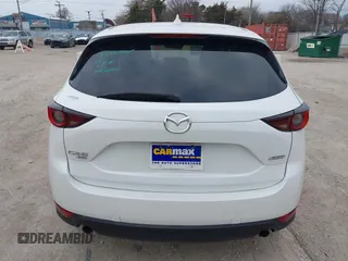 2018 Mazda CX-5 Touring z VIN JM3KFBCM6J0323107, wystawiony jako IAAI lot #41895519 z przebiegiem 86 124 mil mil oraz . Historia ofert i sprzedaży dostępna na DreamBid. Obrazek 16.