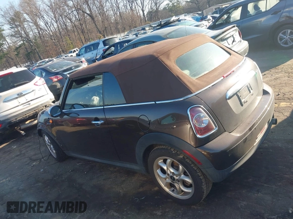 2011 MINI Convertible with VIN WMWZN3C55BT133367, listed as a IAAI auction lot 41781374 with 124,036 mi miles and . Bid and sale history available at DreamBid. Image 14.
