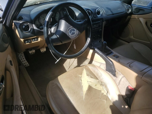 2002 Mazda MX-5 Miata Cloth z VIN JM1NB353220222868, wystawiony jako Copart lot #59944345 z przebiegiem 159 595 mil mil oraz Szkoda całkowita • Salvage title. Historia ofert i sprzedaży dostępna na DreamBid. Obrazek 8.