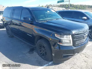 2015 Chevrolet Suburban LS with VIN 1GNSCHKC4FR247183, listed as a IAAI auction lot 41588924 with 283,741 mi miles. Bid and sale history available at carsss.com. Image 1.