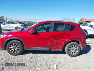 2014 Mazda CX-5 Touring с VIN JM3KE2CY7E0341630, выставлен на аукционе IAAI как лот 40830171 с пробегом 117 430 миль миль и . История ставок и продаж доступна на DreamBid. Изображение 14.