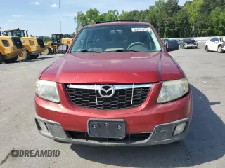 2008 Mazda Tribute Touring with VIN 4F2CZ96108KM14483, listed as a Copart auction lot 55091955 with 133,397 mi miles and Salvage Title. Bid and sale history available at DreamBid. Image 5.