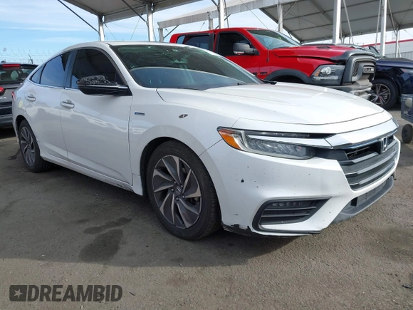2021 Honda Insight Touring with VIN 19XZE4F97ME002699, listed as a IAAI auction lot 41397130 with 213,920 mi miles and . Bid and sale history available at carsss.com. Image 1.