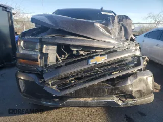 2016 Chevrolet Silverado 1500 LT with VIN 3GCUKREC2GG217221, listed as a Copart auction lot 50032915 with 105,022 mi miles and Salvage Title. Bid and sale history available at DreamBid. Image 5.