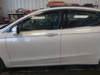 2016 Ford Fusion Titanium z VIN 3FA6P0D93GR116355, wystawiony jako IAAI lot #42158991 z przebiegiem 59 602 mil mil oraz . Historia ofert i sprzedaży dostępna na DreamBid. Obrazek 14.