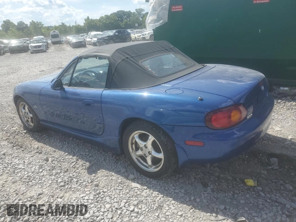 1999 Mazda MX-5 Miata with VIN JM1NB353XX0134898, listed as a Copart auction lot 63429475 with 140,595 mi miles and Clean title. Bid and sale history available at DreamBid. Image 2.