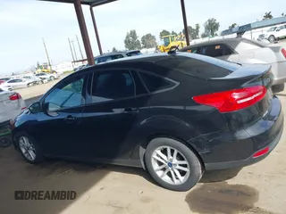 2015 Ford Focus SE with VIN 1FADP3F25FL330463, listed as a IAAI auction lot 41755867 with 72,725 mi miles. Bid and sale history available at carsss.com. Image 14.