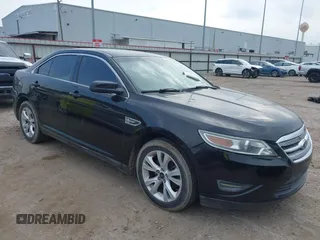 2011 Ford Taurus SEL z VIN 1FAHP2EW0BG189417, wystawiony jako IAAI lot #42278626 z przebiegiem 159 767 mil mil oraz . Historia ofert i sprzedaży dostępna na DreamBid. Obrazek 1.