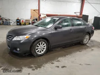 2010 Toyota Camry with VIN 4T4BF3EK1AR052252, listed as a Copart auction lot 50243895 with 116,146 mi miles and Salvage Title. Bid and sale history available at carsss.com. Image 1.
